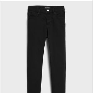 Mid Rise Fade Resist Black Skinny Jean